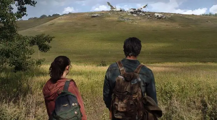 Crashed plane and Joel and Ellie looking at it