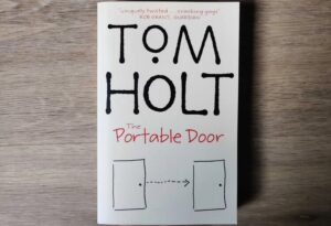 The Portable Door, first book from J.W. Wells & Co. series