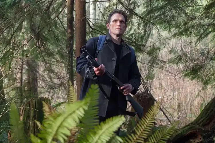 Wayward Pines a man with a shotgun