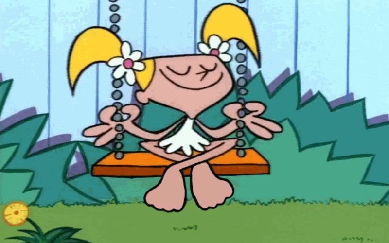 Dee Dee sitting on a swing 